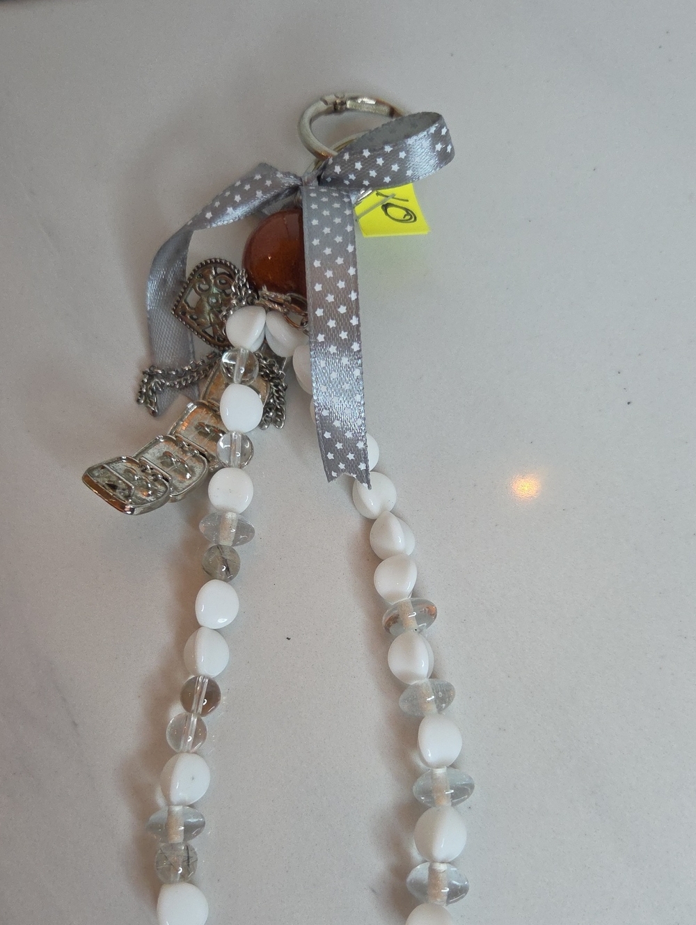 10 - Beaded White and Clear Bag Charm with Gray Star Ribbon